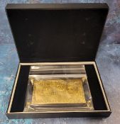 A 24ct gold Bank of England £50 bank note in perspex presentation capsule and box