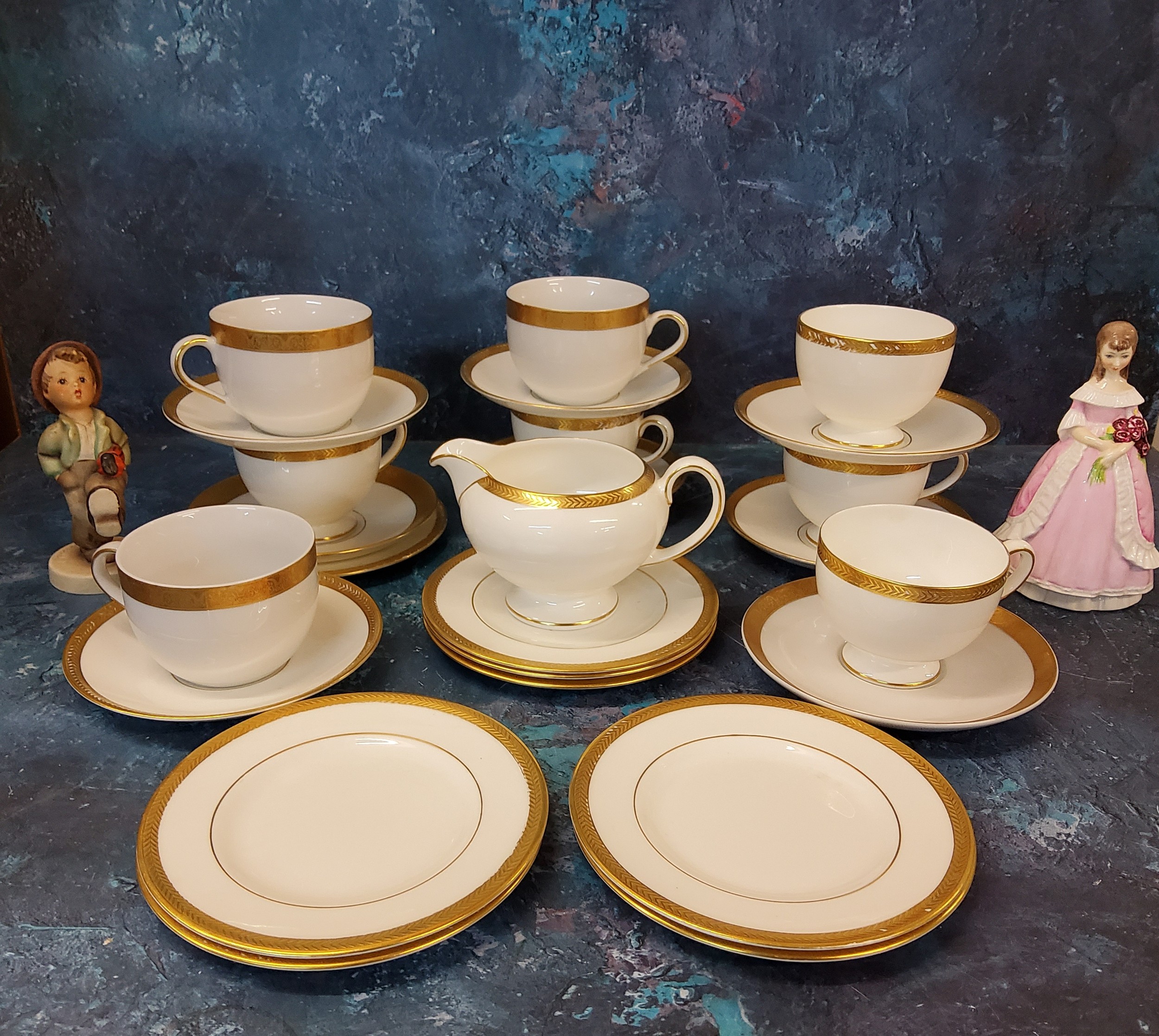 A Royal Worcester figure, Modesty, crown and circle mark;   a Wedgwood Senator pattern tea