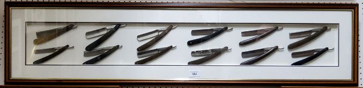 A Framed display of twelve cut throat razors; Wade and Butcher Sheffield, Kaye "The Master Razor",
