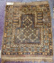 A woollen prayer rug, 43in x 36in