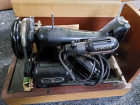 A 20th century cased Singer sewing machine