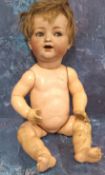 A Simon & Halbig/K&R 126 bisque head baby doll, German c.1920, with blue glass eyes, open mouth with