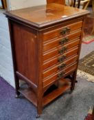 A George V mahogany  music cabinet, six drawers, 80cm high, 52cm wide, c.1915