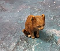 An Austrian cold painted bronze model, of a cat, 5cm high