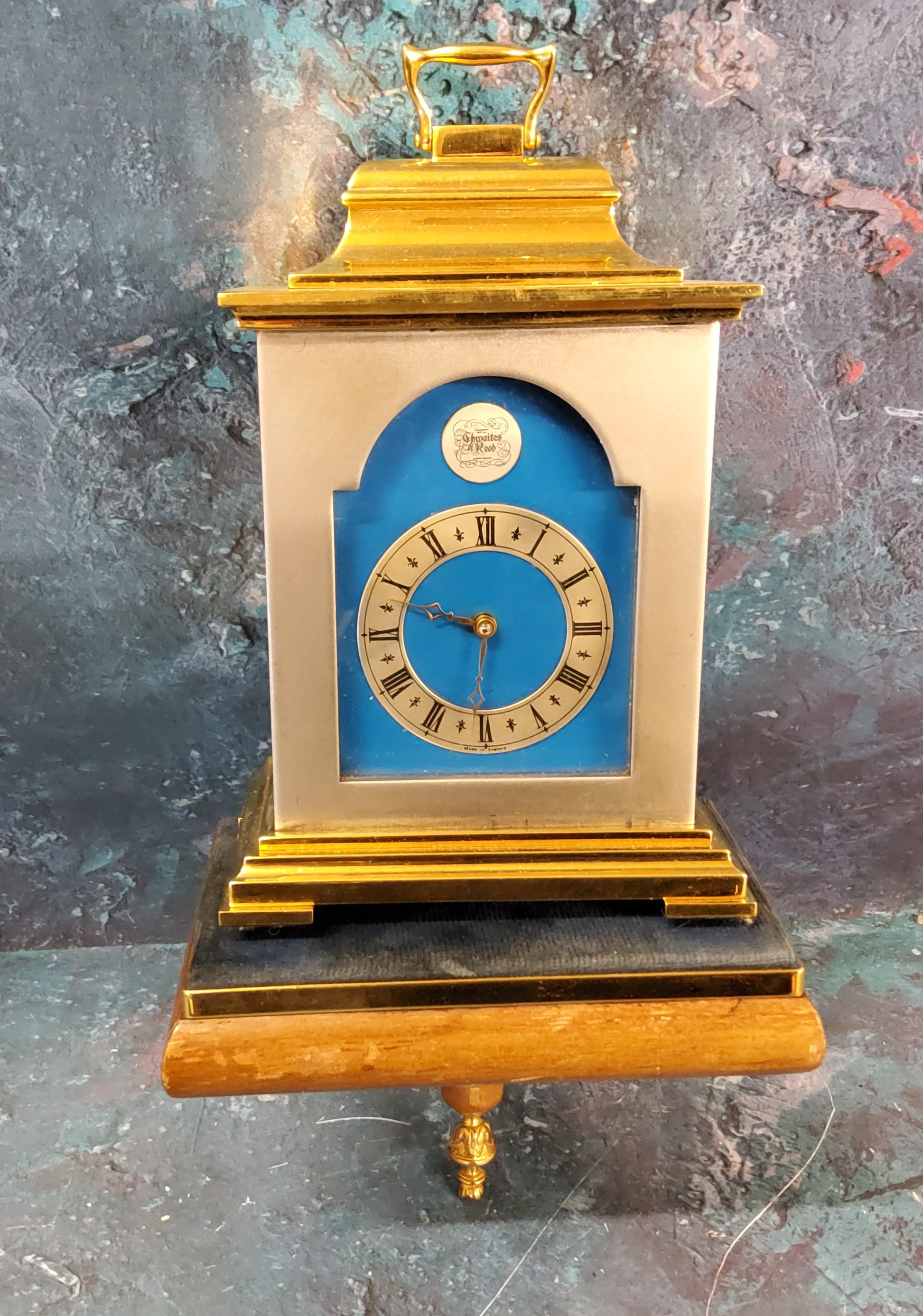 A Thwaites and Reed brass carriage clock, silvered chapter ring, Roman numerals, pierced brass