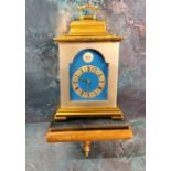 A Thwaites and Reed brass carriage clock, silvered chapter ring, Roman numerals, pierced brass