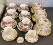 A Royal Doulton tea service, for six, printed with roses,  Cupids's bow and arrow and gilt swags,