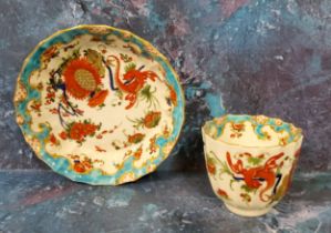 A Worcester Jabberwocky pattern fluted coffee cup and saucer, shaped rim, painted in the Kakiemon