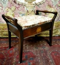An Arts & Crafts mahogany piano stool, William Morris type upholstery. c.1915