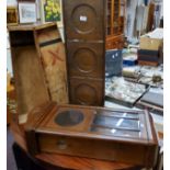 An early 20th century oak three tier folding cake stand, 87cm high, c.1930;  an oak wall clock case,