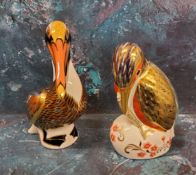 A Royal Crown Derby paperweight, Honey Bear, printed mark, gold stopper, boxed;  another, Pelican,