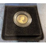 A Royal Mint Elizabeth II full sovereign dated 1979, complete with original presentation box