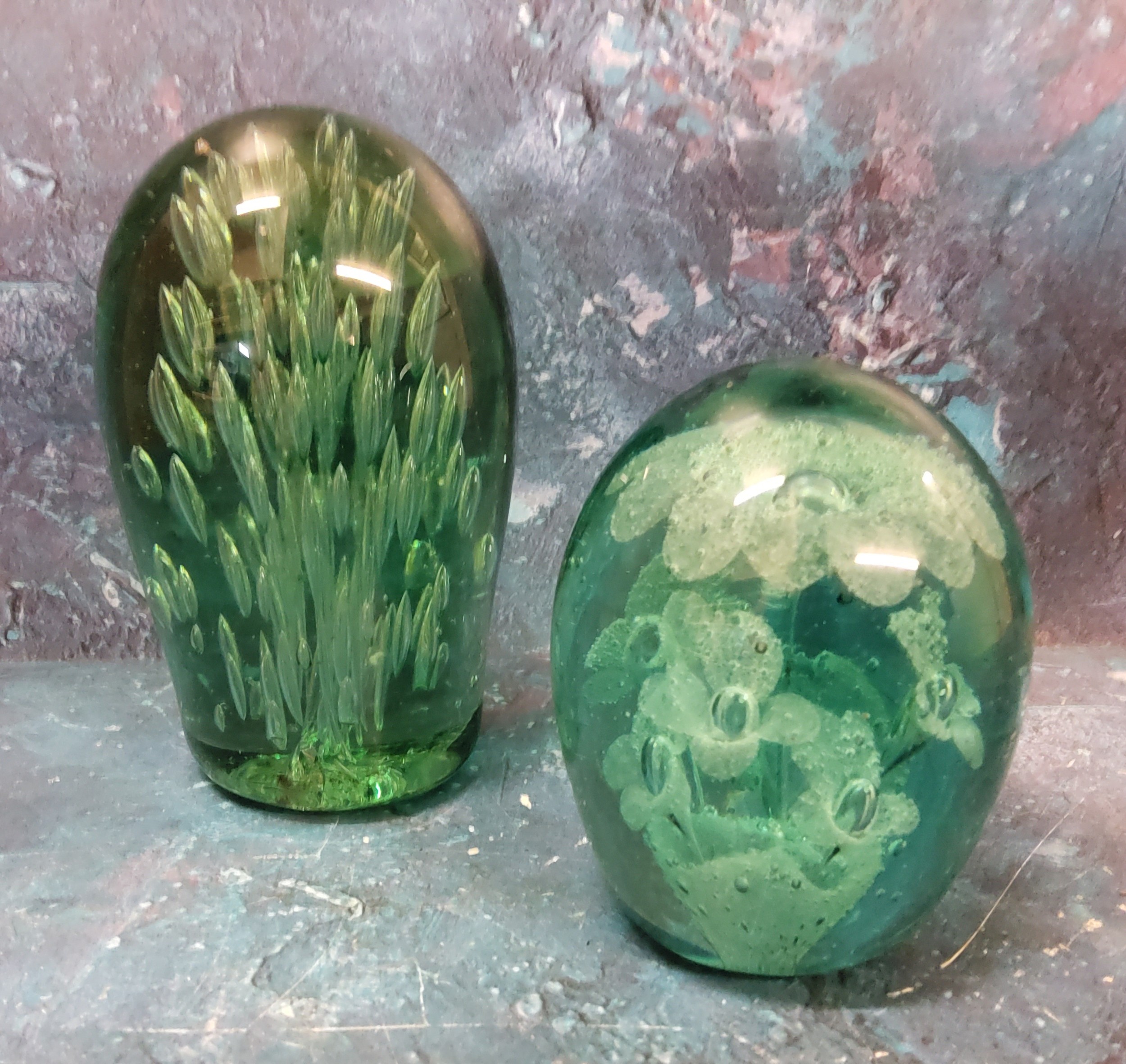 A Victorian green glass dump, sulphur flower inclusion9.5cm high, c.1880;  another, bubble