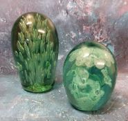 A Victorian green glass dump, sulphur flower inclusion9.5cm high, c.1880;  another, bubble