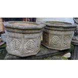 A pair of impressive reconstituted stone planters, each decorated with Yorkshire Rose in relief to