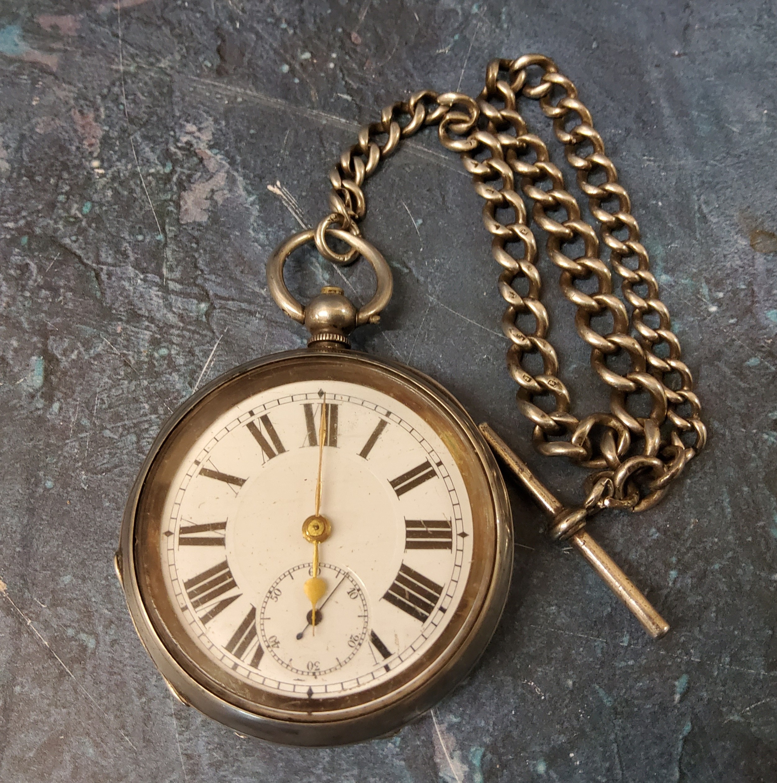 A silver open faced pocket watch, subsidiary seconds dial, marked 925;  a a silver Albert, 31g