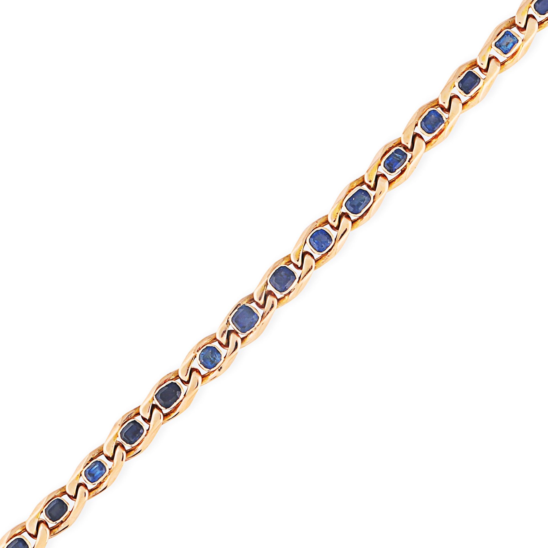 A SAPPHIRE CURB LINK BRACELET in yellow gold, comprising a row of elongated curb links, each set ...