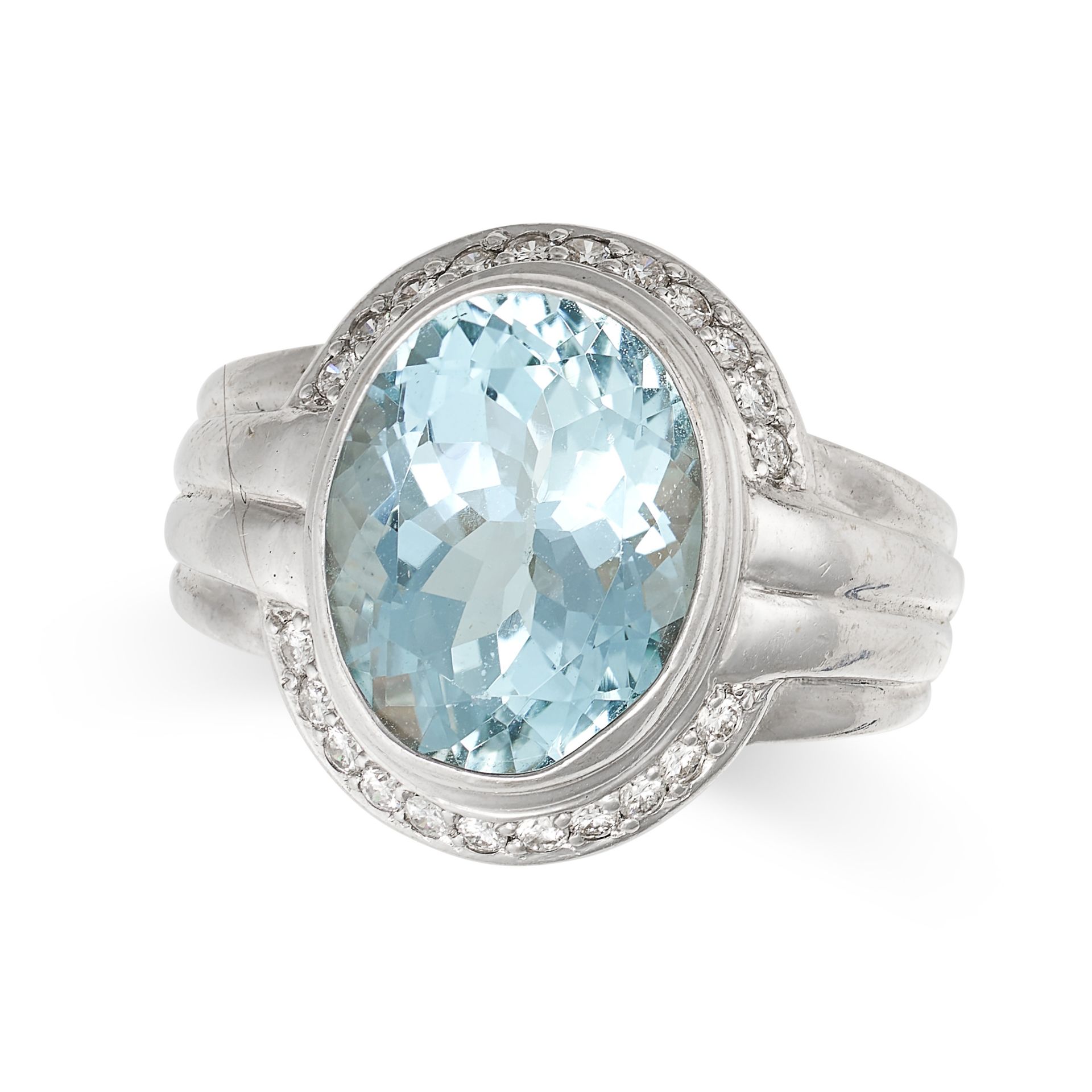 AN AQUAMARINE AND DIAMOND RING in 18ct white gold, set with an oval cut aquamarine of approximate...