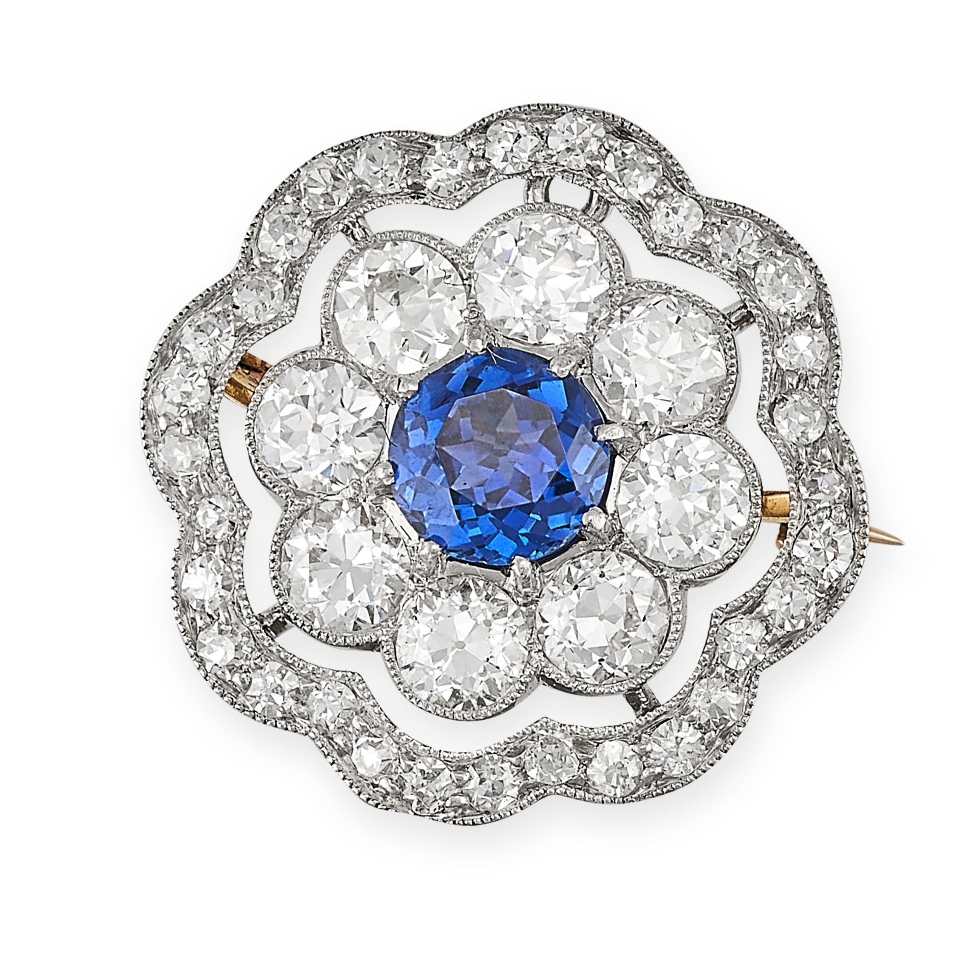 AN ANTIQUE SAPPHIRE AND DIAMOND BROOCH, EARLY 20TH CENTURY designed as a stylised flower, set to ...