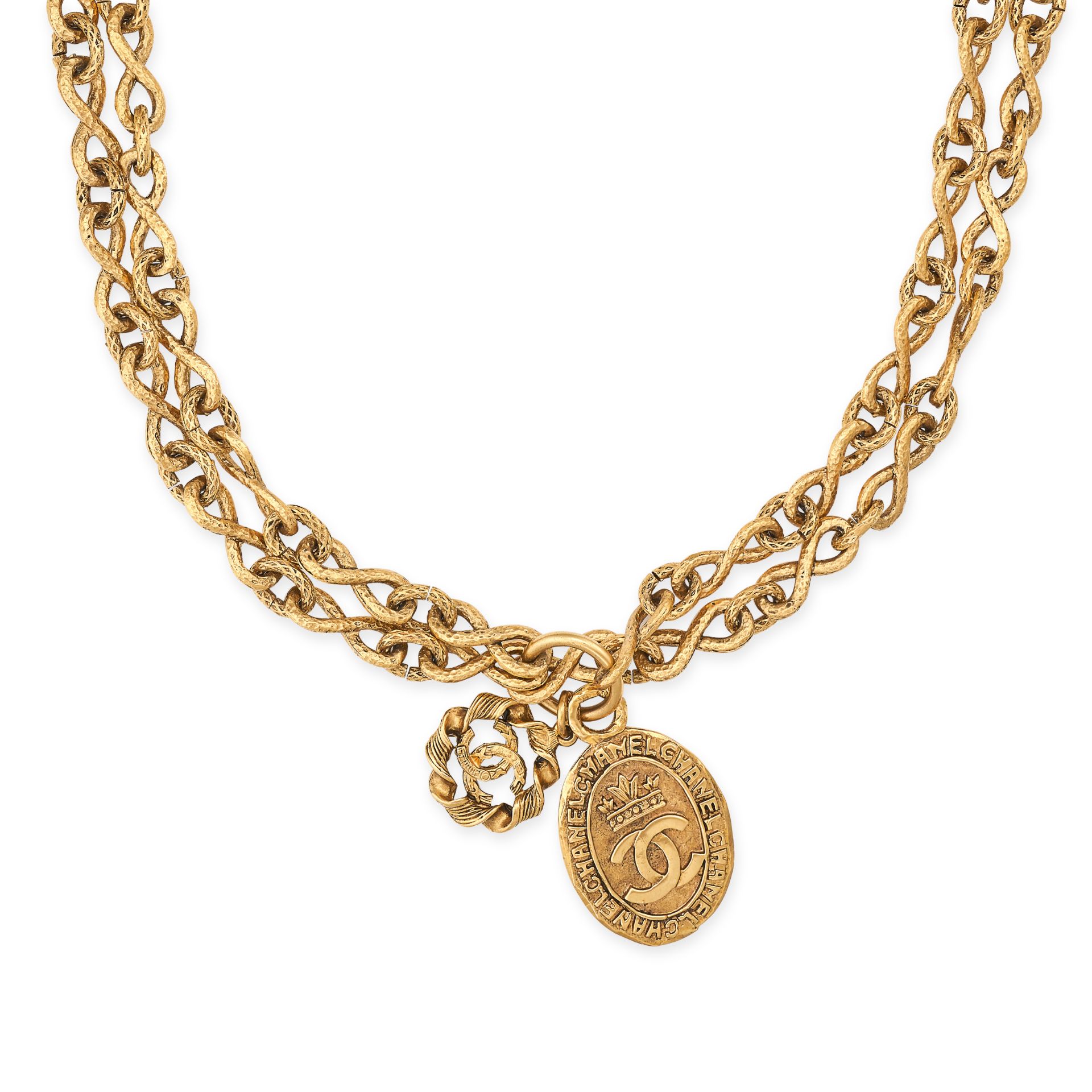 NO RESERVE - CHANEL, A VINTAGE PENDANT NECKLACE comprising a two row fancy figure of eight fancy ...