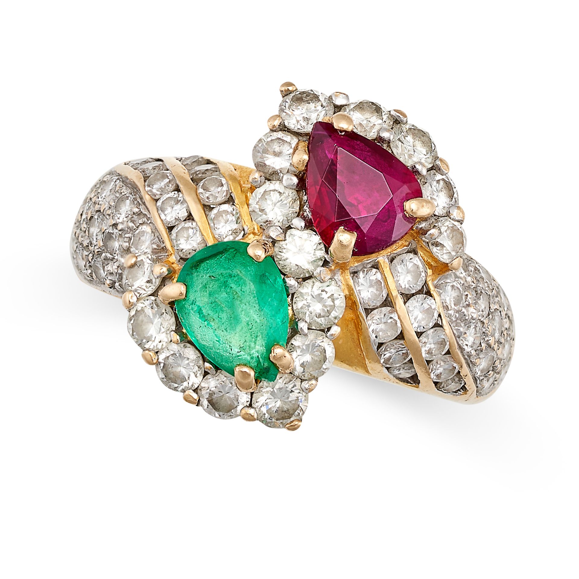 A VINTAGE RUBY, EMERALD AND DIAMOND TOI ET MOI RING in yellow gold, set with a pear cut ruby of a...