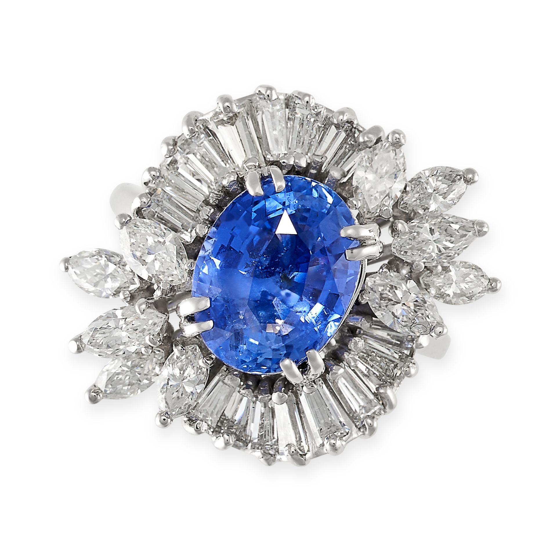 A CEYLON NO HEAT SAPPHIRE AND DIAMOND RING in platinum, set with a central oval mixed cut sapphir...