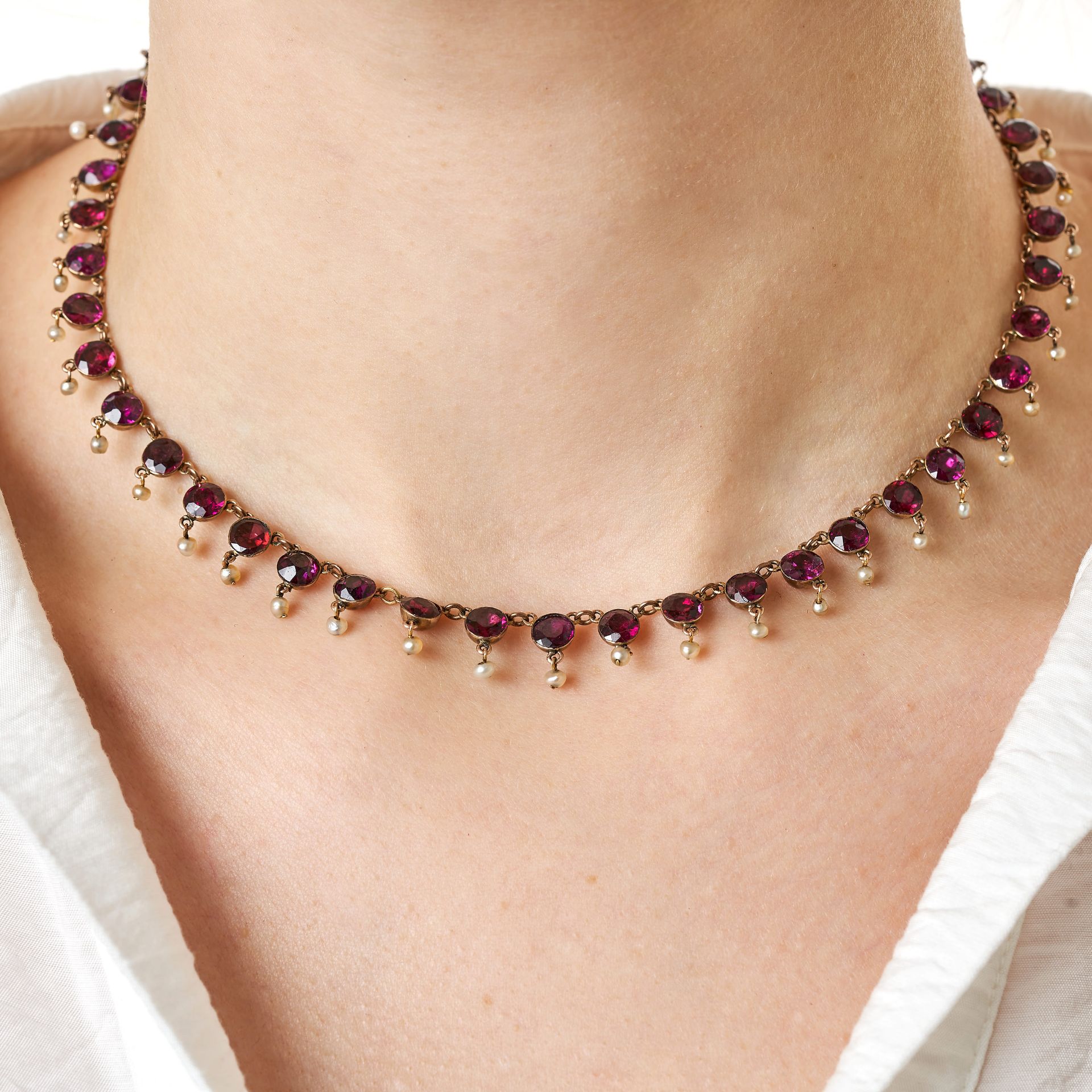 AN ANTIQUE GARNET AND PEARL NECKLACE, 19TH CENTURY in yellow gold, comprising a row of round cut ... - Image 2 of 2