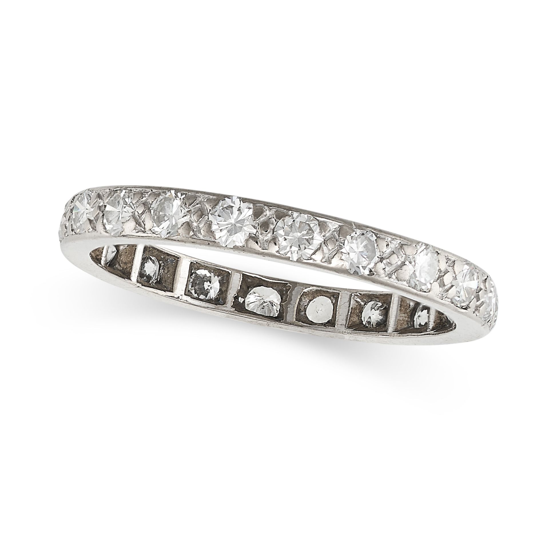 A DIAMOND ETERNITY RING set all around with round cut diamonds, no assay marks, size M / 6.25, 1....