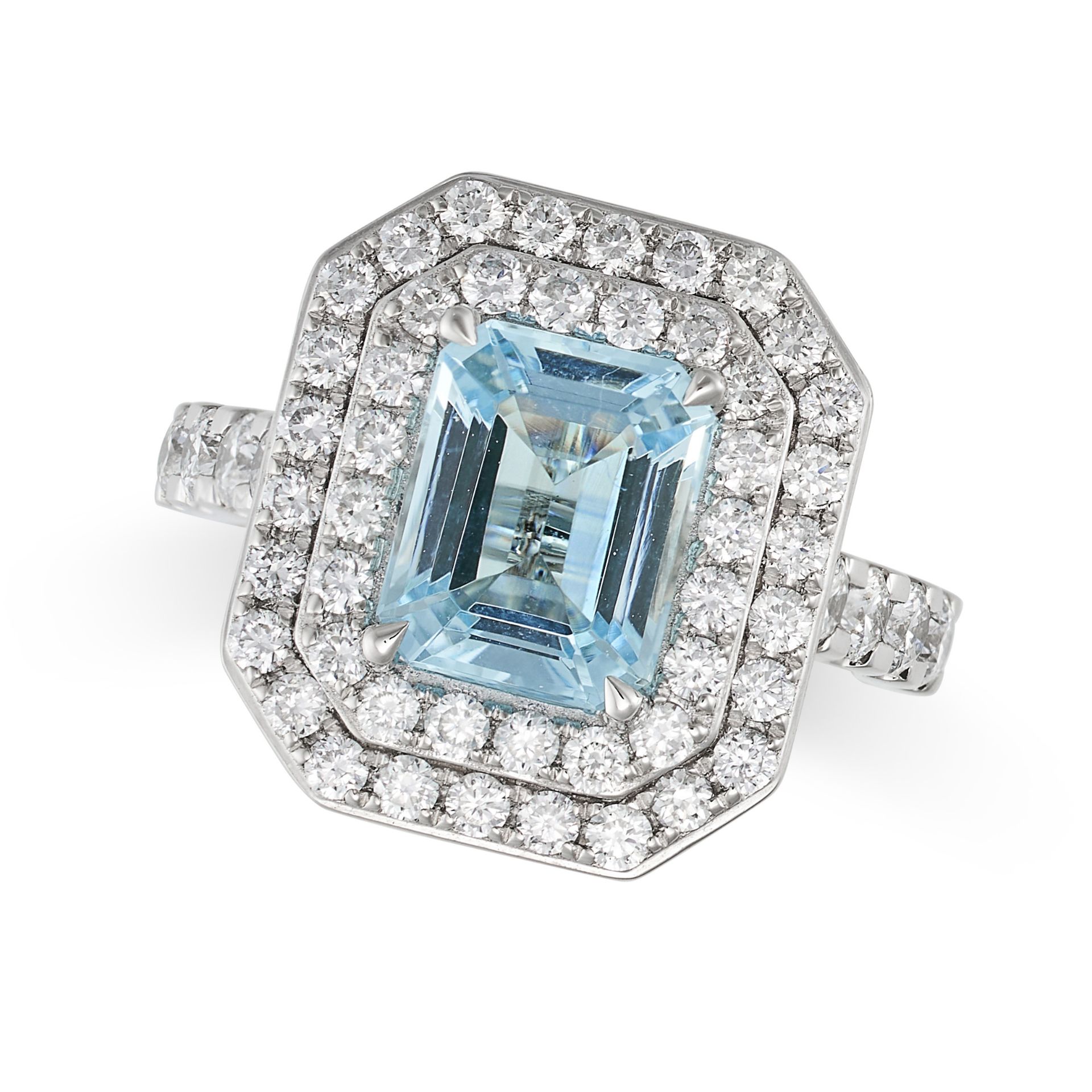 AN AQUAMARINE AND DIAMOND CLUSTER RING in platinum, set to the centre with an octagonal step cut ...