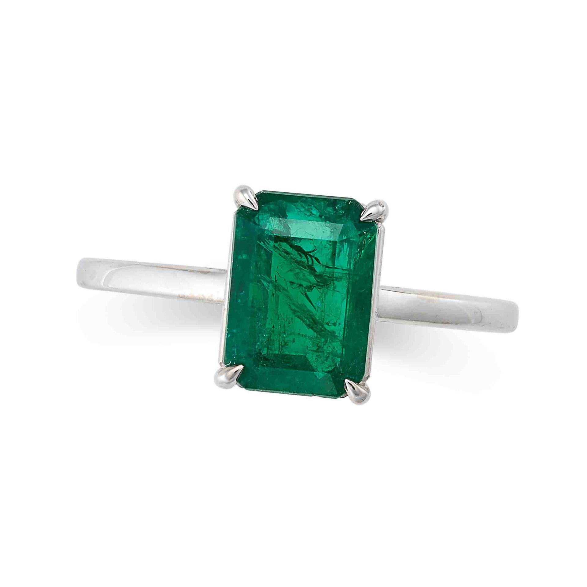 AN EMERALD RING in 18ct white gold, set with an octagonal step cut emerald of approximately 1.80 ...