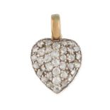 AN ANTIQUE DIAMOND HEART CHARM / PENDANT in yellow gold and silver, designed as a heart set throu...