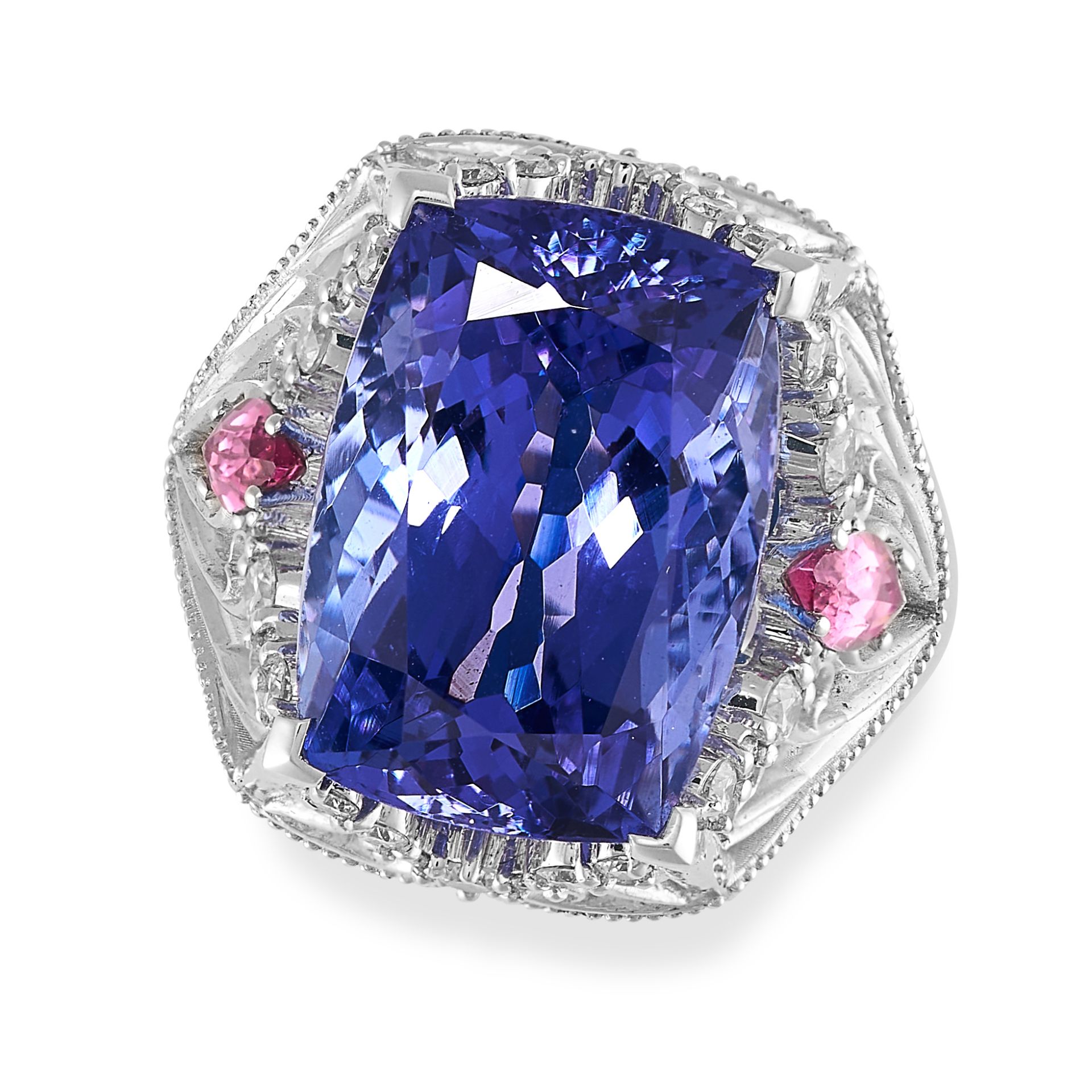 A TANZANITE, PINK TOURMALINE AND DIAMOND DRESS RING set with a cushion shaped tanzanite of 11.28 ...