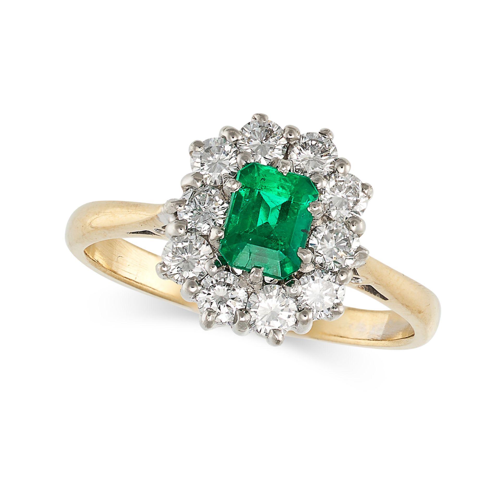 AN EMERALD AND DIAMOND CLUSTER RING in yellow gold, set with an octagonal step cut emerald of app...