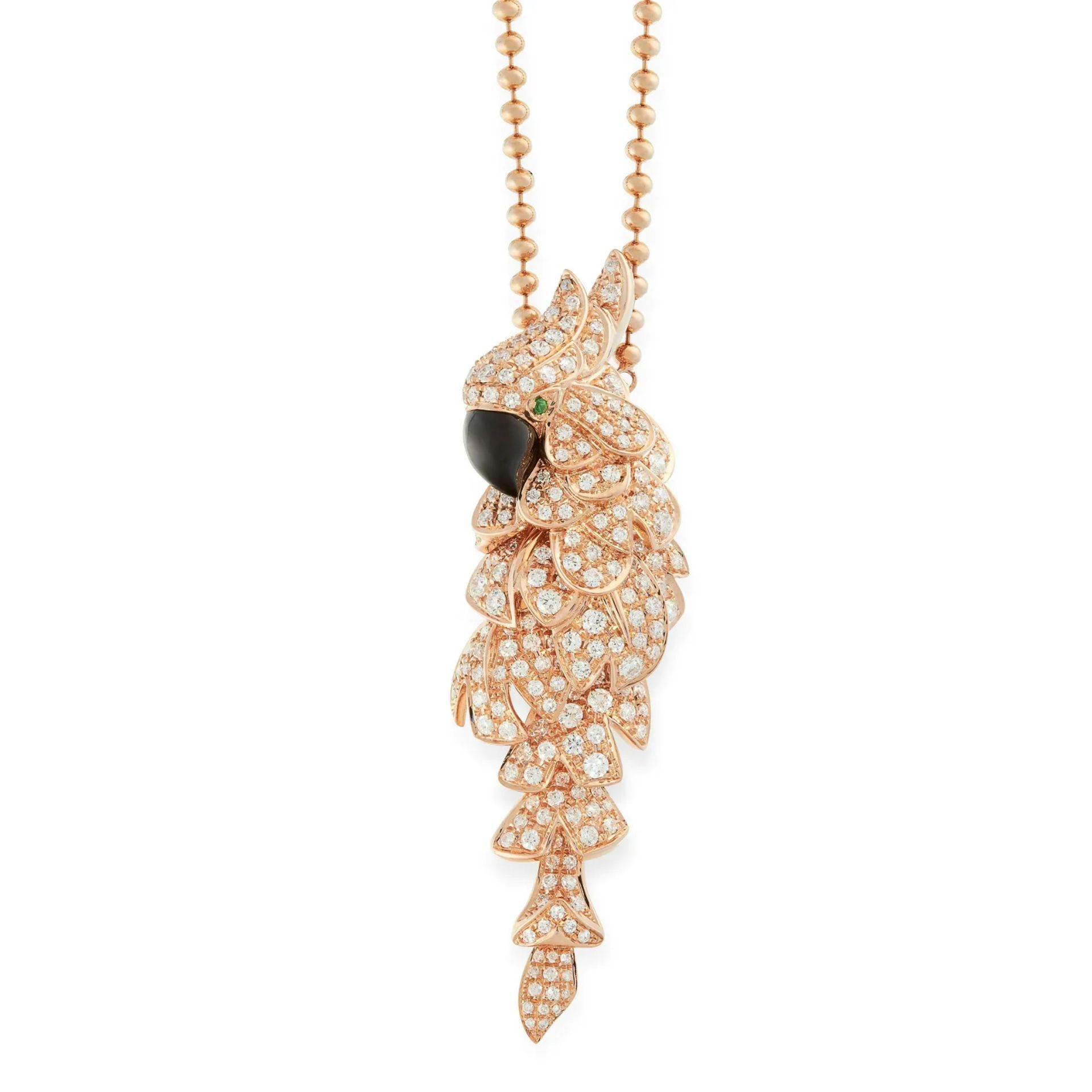 AN ONYX, DIAMOND AND EMERALD BIRD PENDANT NECKLACE in 18ct rose gold, designed as a bird, set wit...