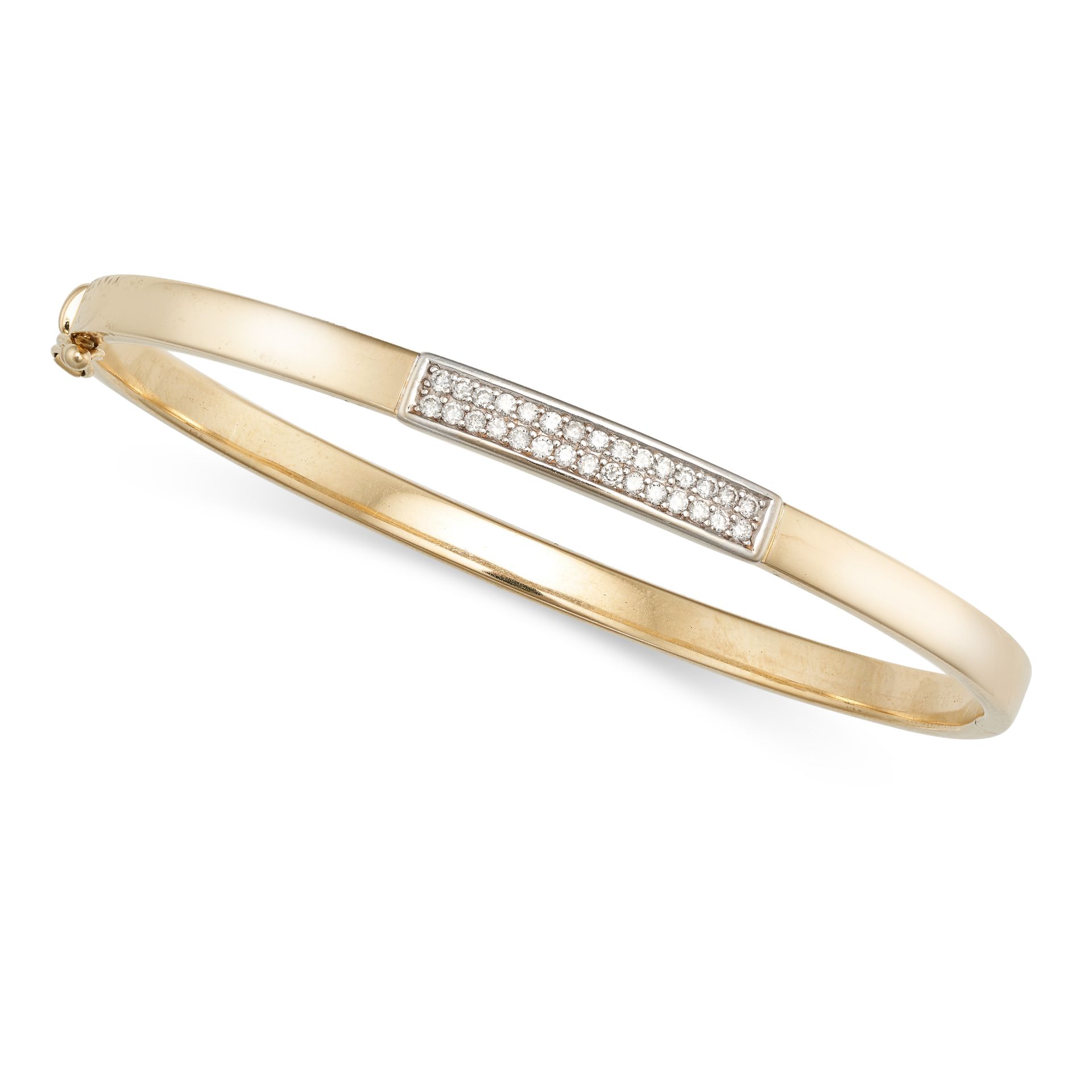 A DIAMOND BANGLE in 14ct yellow gold, the hinged bangle set with two rows of round brilliant cut ...