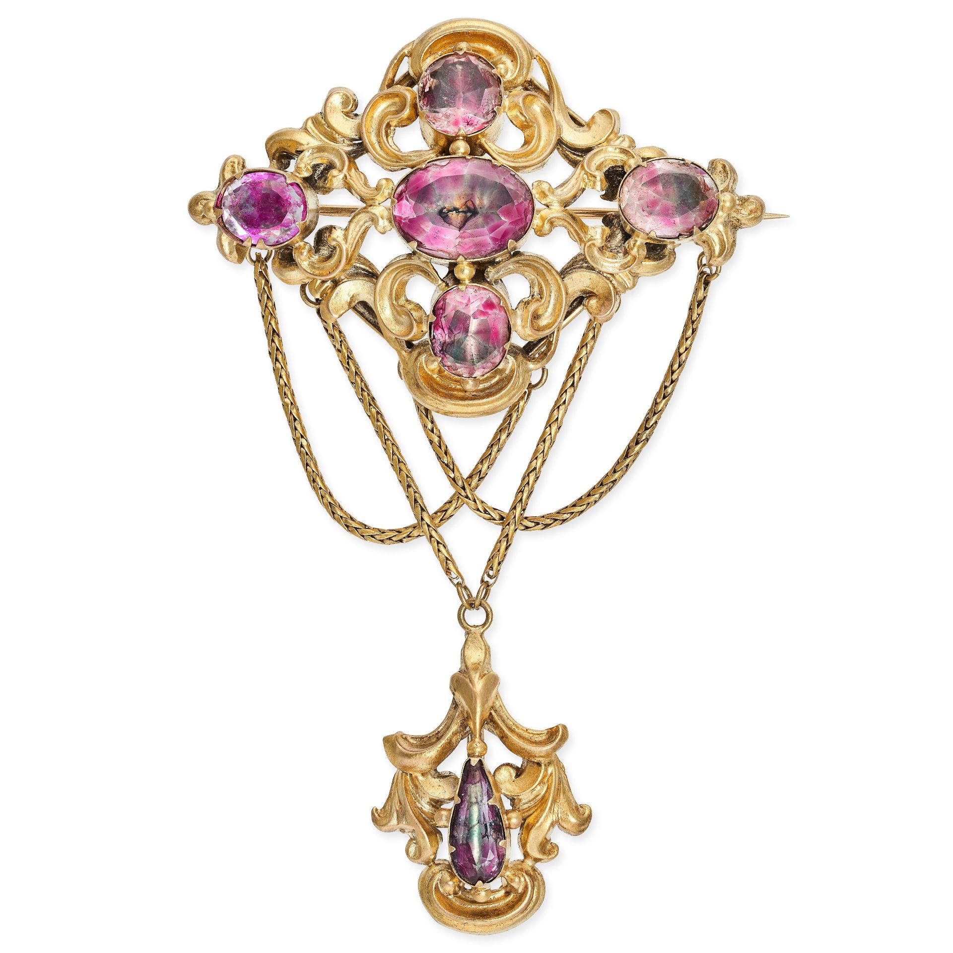 AN ANTIQUE FOILED ROCK CRYSTAL BROOCH, 19TH CENTURY in scrolling openwork design, set with five o...