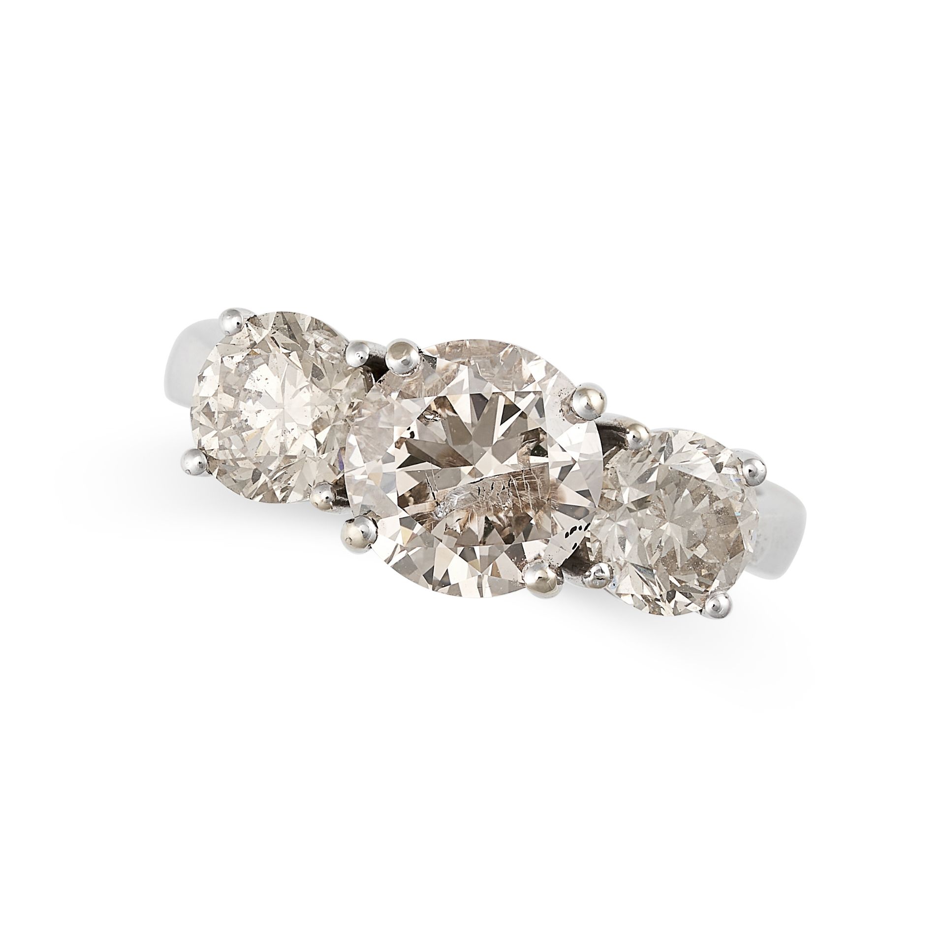 A DIAMOND THREE STONE RING in 18ct white gold, set with three round brilliant cut diamonds, the d...