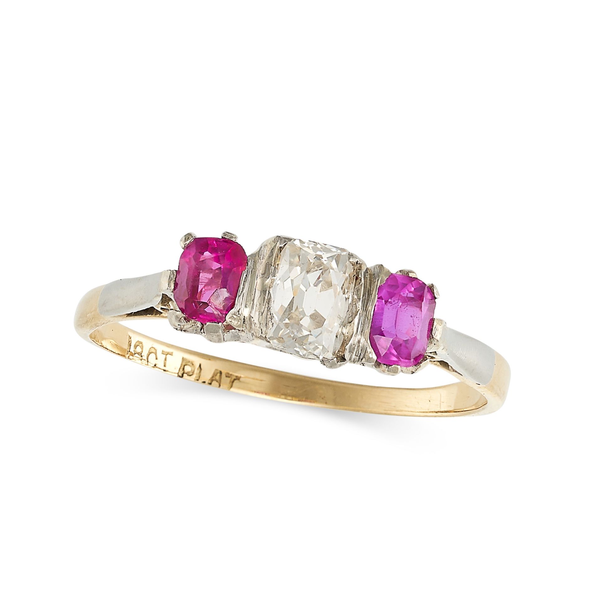 A RUBY AND DIAMOND THREE STONE RING in 18ct yellow gold and platinum, set with an old cushion cut...