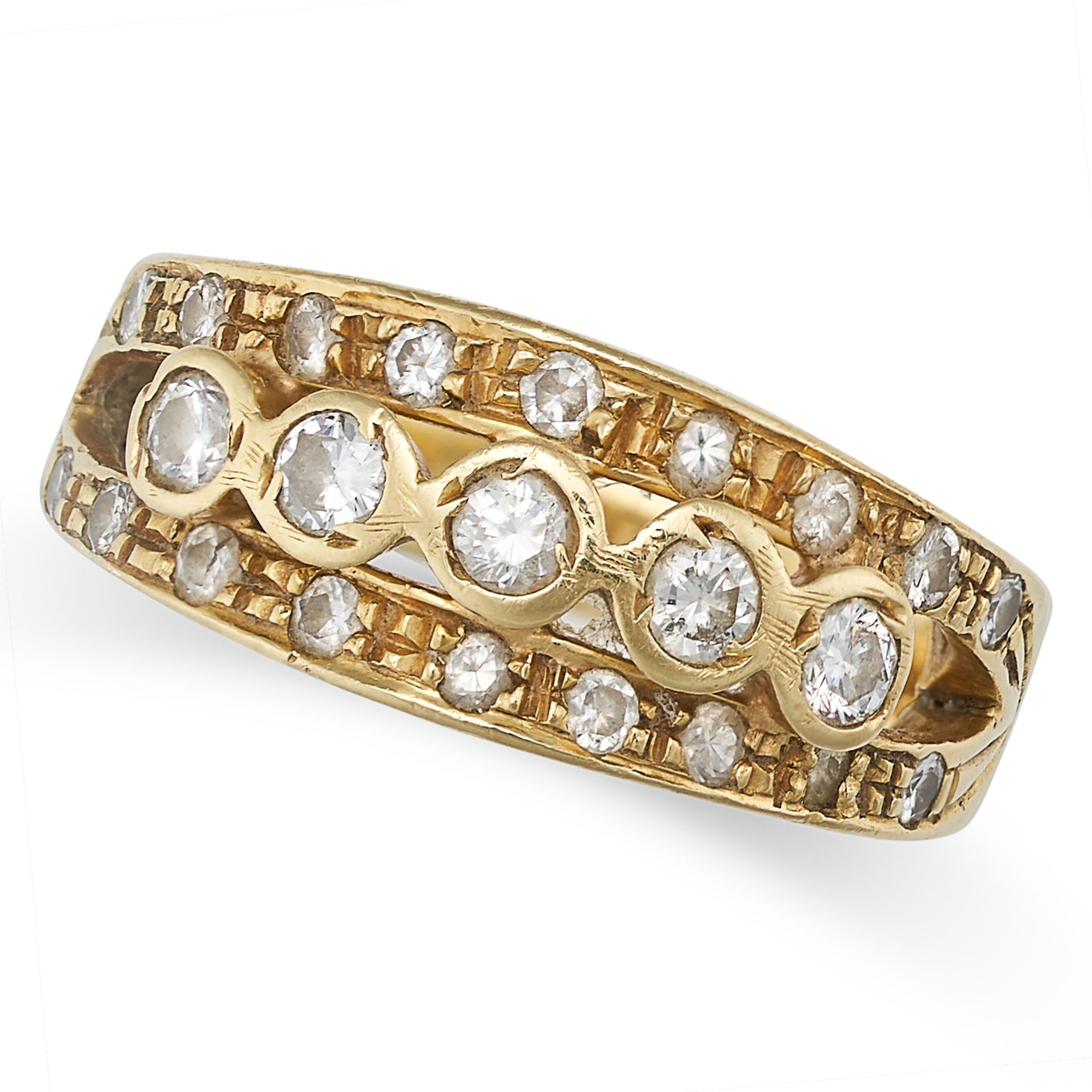 A DIAMOND DRESS RING in 18ct yellow gold, set with five principal round brilliant cut diamonds, a...