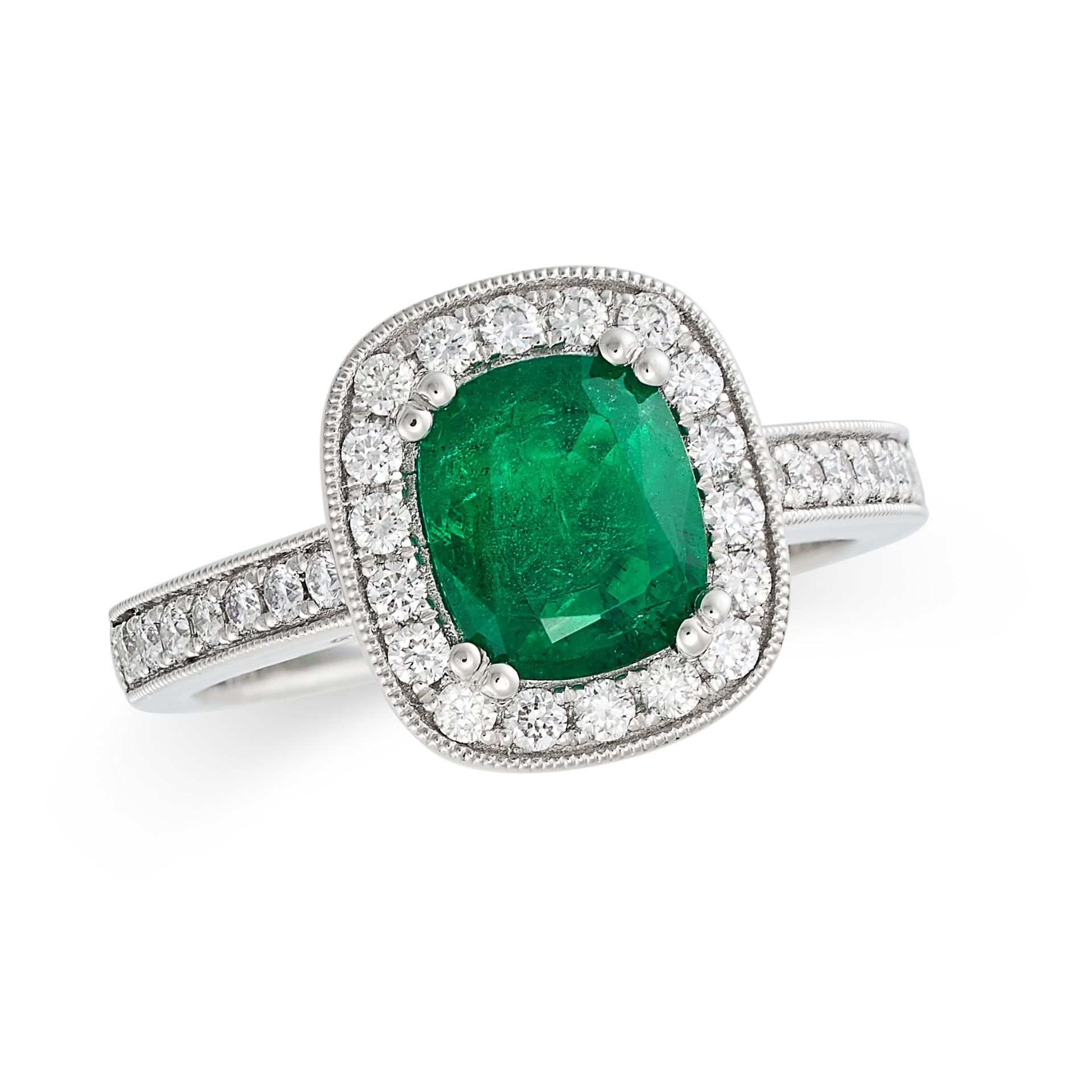 AN EMERALD AND DIAMOND CLUSTER RING in platinum, set with a cushion cut emerald of 1.40 carats to...
