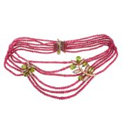 VAN CLEEF & ARPELS, A VINTAGE RUBY, PERIDOT AND DIAMOND NECKLACE, CIRCA 1960 in 18ct rose gold, c...