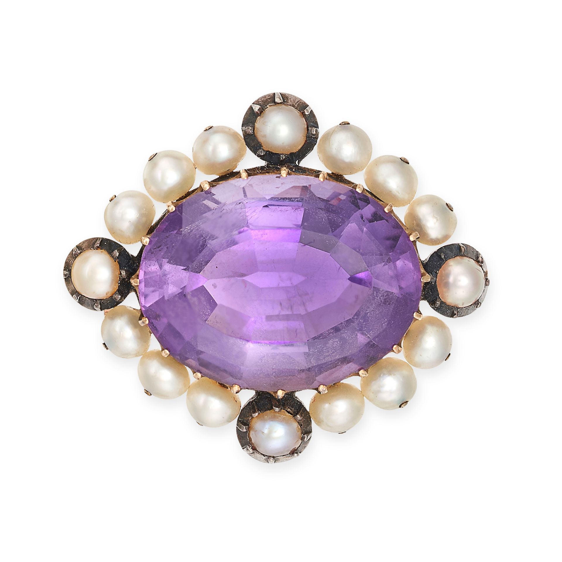 AN AMETHYST AND PEARL BROOCH in yellow gold and silver, set with an oval cut amethyst in a border...