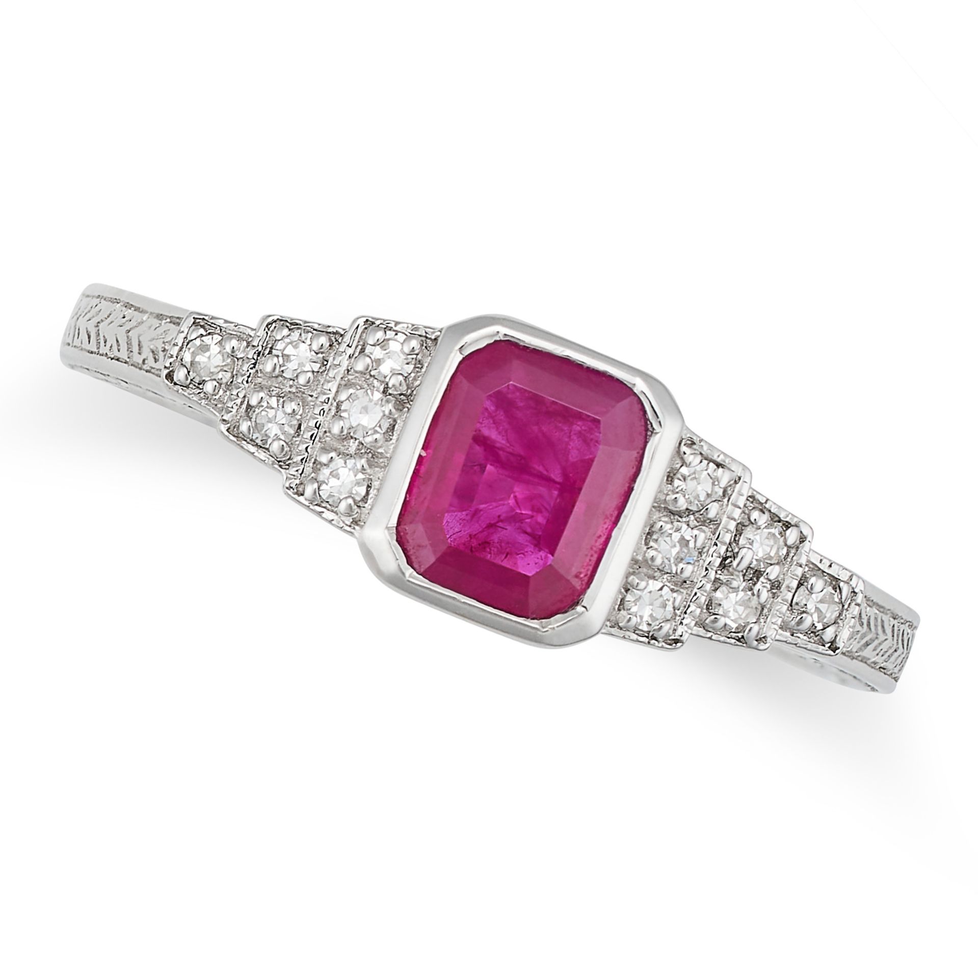 A RUBY AND DIAMOND RING in 18ct white gold, set with an octagonal step cut ruby of approximately ...