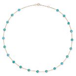 A TURQUOISE CHAIN NECKLACE in 18ct yellow gold, the trace chain set with staggered cabochon turqu...