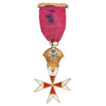 AN ANTIQUE AUSTRO HUNGARIAN KNIGHTS TEMPLAR ORDER OF MERIT comprising a red ribbon suspending a g...