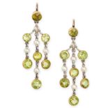 A PAIR OF ANTIQUE PEARL AND PERIDOT DROP EARRINGS in platinum and yellow gold, each set with a ro...