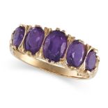 AN AMETHYST DRESS RING in 9ct yellow gold, set with a row of five graduated oval cut amethysts, f...