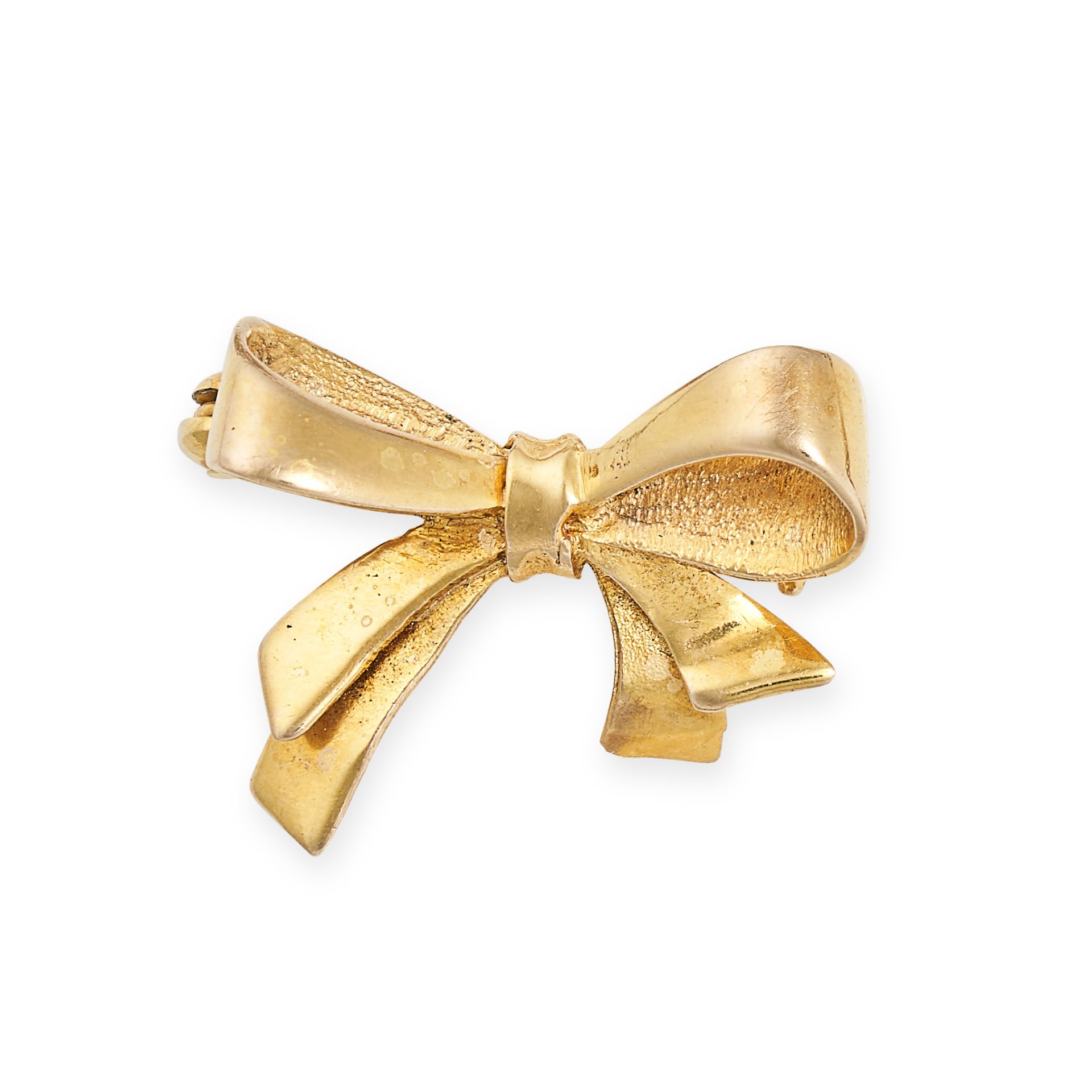 A VINTAGE GOLD BOW BROOCH  in 9ct yellow gold, designed as a ribbon tied into a bow, full British...