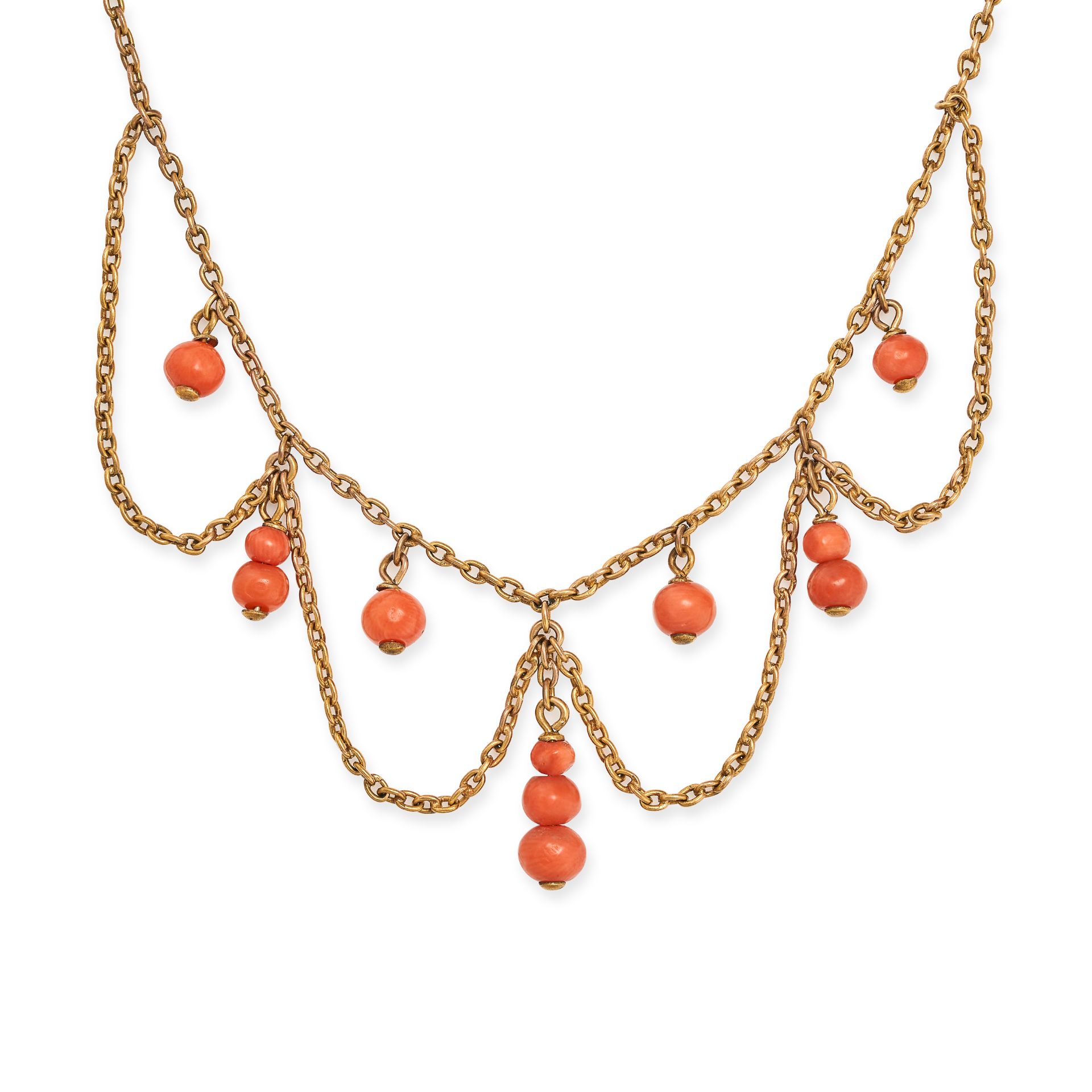 AN ANTIQUE CORAL SWAG NECKLACE in yellow gold, comprising a trace link chain with four chain swag...