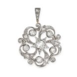 AN ANTIQUE DIAMOND SNOWFLAKE PENDANT in yellow gold and silver, the spiraling pendant set through...